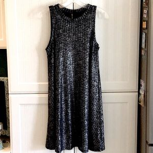 Petite, Swingy A line dress.  sleeveless Navy blue with metallic shimmer.